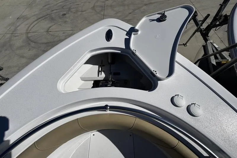  Yacht Photos Pics 2026 Sportsman Open 252 Center Console boat with open storage compartment.