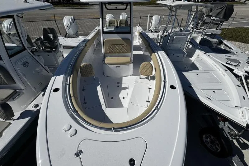  Yacht Photos Pics 2026 Sportsman Open 252 Center Console boat with spacious seating and modern design.