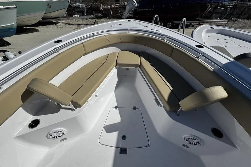  Yacht Photos Pics 2026 Sportsman Open 252 Center Console boat with tan seating and spacious deck layout.