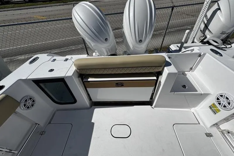  Yacht Photos Pics 2026 Sportsman Open 252 Center Console boat interior with dual engines and seating.