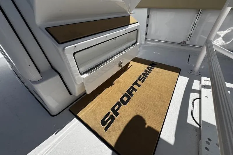  Yacht Photos Pics 2026 Sportsman Open 252 Center Console interior with branded mat and storage.