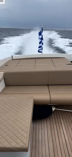  Yacht Photos Pics Otam 45 yacht cruising on open water, featuring sleek deck design, 1997 model.