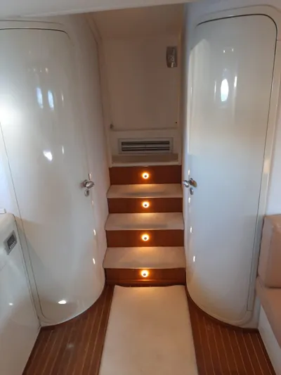  Yacht Photos Pics Interior of 1997 Otam 45 yacht with sleek design and illuminated steps.