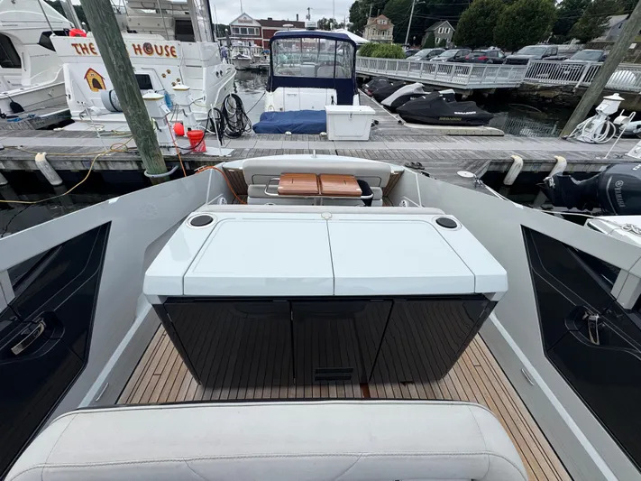  Yacht Photos Pics 2021 Fairline F//Line 33 yacht interior with sleek design and modern amenities at a marina.