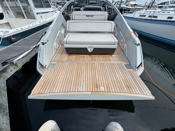  Yacht Photos Pics 2021 Fairline F//Line 33 yacht with teak deck, docked at marina.