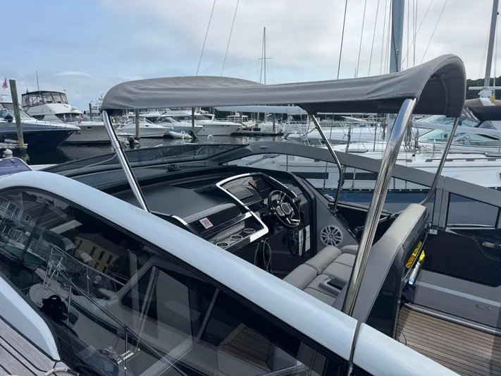  Yacht Photos Pics 2021 Fairline F//Line 33 yacht interior with sleek design at marina.