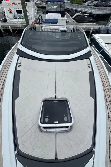  Yacht Photos Pics 2021 Fairline F//Line 33 yacht with sleek deck design, docked at marina.