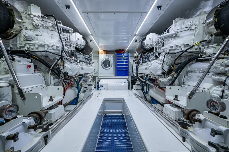 Boobah Yacht Photos Pics Engine room of 2017 F&S Custom Express Sportfish with dual engines and storage.