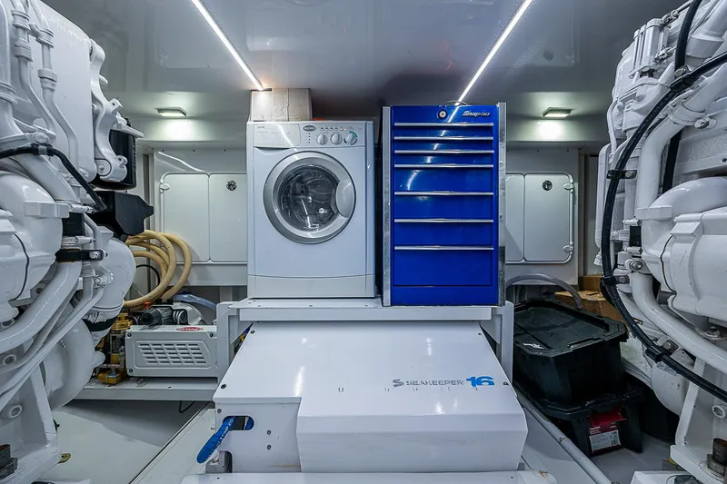 Boobah Yacht Photos Pics Engine room of 2017 F&S Custom Express Sportfish with washer and tool chest.