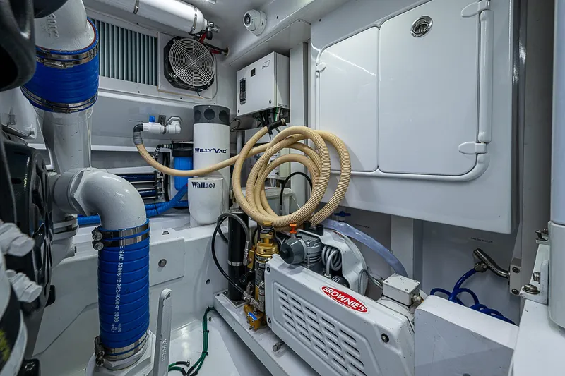 Boobah Yacht Photos Pics Engine room of 2017 F&S Custom Express Sportfish with advanced equipment and piping.