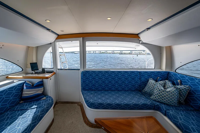 Boobah Yacht Photos Pics Interior of 2017 F&S Custom Express Sportfish with blue seating and ocean view.