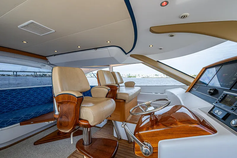 Boobah Yacht Photos Pics Luxurious 2017 F&S Custom Express Sportfish yacht interior with plush seating and modern helm.