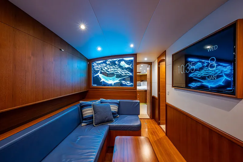 Boobah Yacht Photos Pics Luxurious 2017 F&S Custom Express Sportfish interior with blue seating and modern decor.