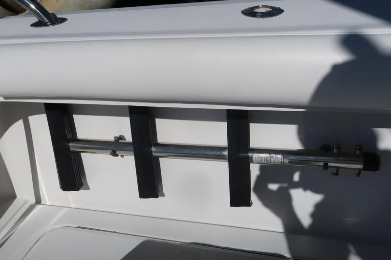 Doran Yacht Photos Pics Luhrs 40 Convertible 2002 boat interior detail with metal rod holder.