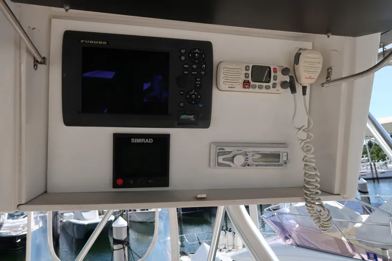 Doran Yacht Photos Pics 2002 Luhrs 40 Convertible boat dashboard with navigation and communication equipment.