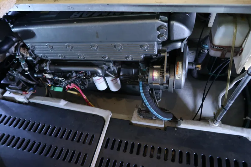 Doran Yacht Photos Pics Engine compartment of 2002 Luhrs 40 Convertible boat, showcasing mechanical components.