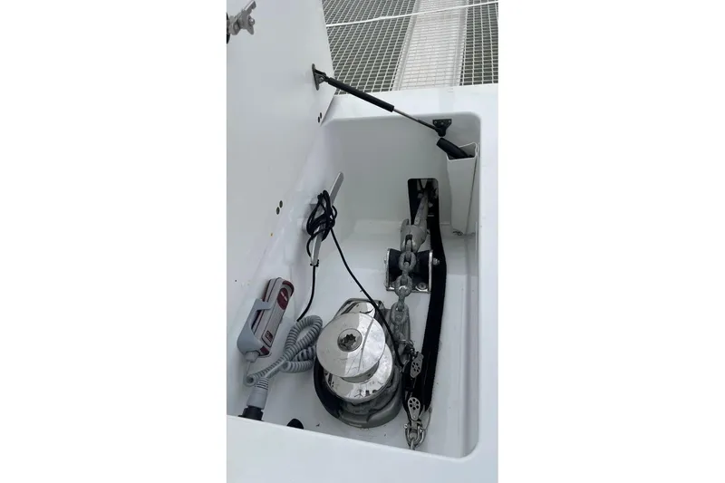Maeva Yacht Photos Pics Anchor compartment of 2023 Fountaine Pajot Catamaran Aura 51, featuring winch and chain.