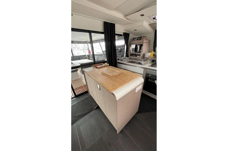 Maeva Yacht Photos Pics Interior of 2023 Fountaine Pajot Catamaran Aura 51, featuring modern kitchen design.