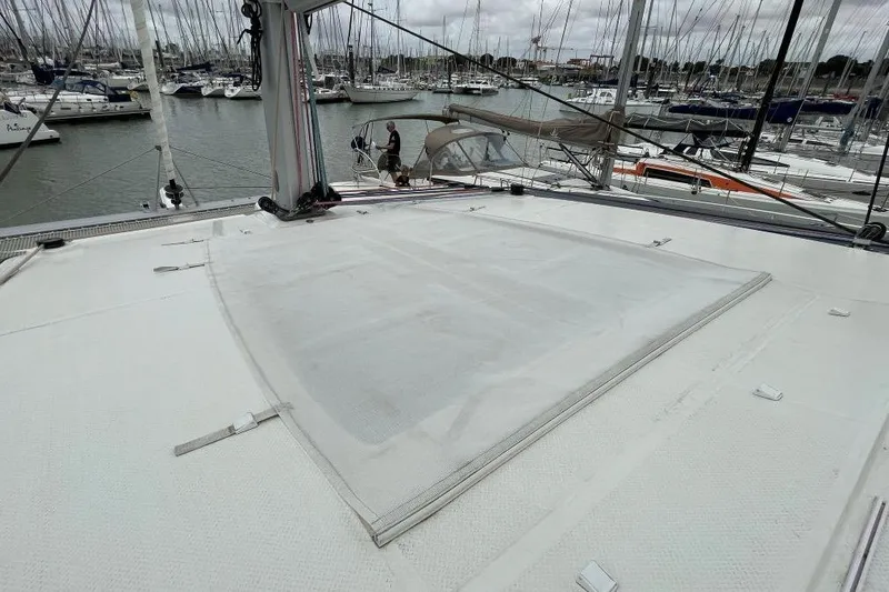 Maeva Yacht Photos Pics 2023 Fountaine Pajot Catamaran Aura 51 deck view in marina setting.