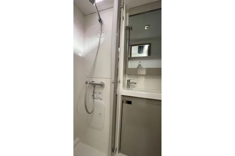 Maeva Yacht Photos Pics Modern bathroom in 2023 Fountaine Pajot Catamaran Aura 51 with shower and sink.