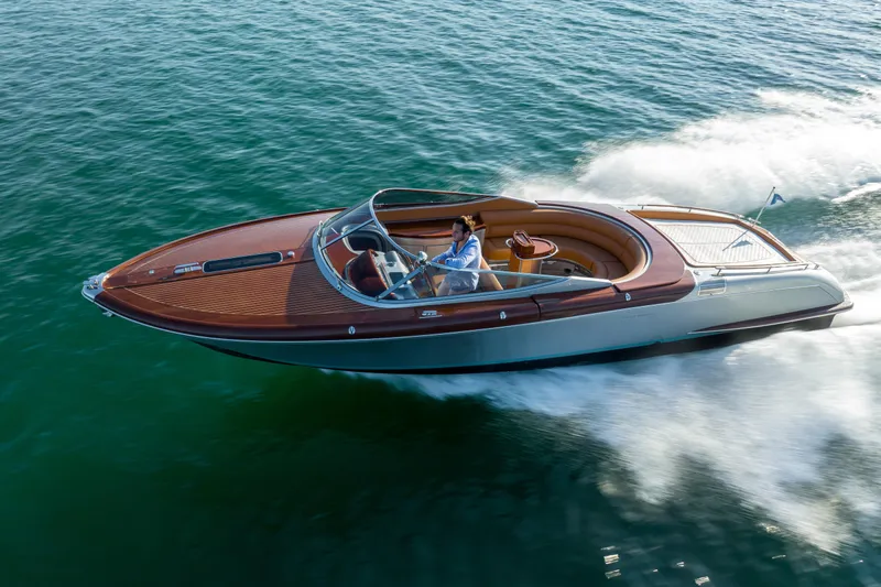 Mia Mia Yacht Photos Pics 2020 Riva Aquariva luxury speedboat cruising on open water.