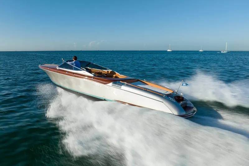 Mia Mia Yacht Photos Pics 2020 Riva Aquariva speedboat cruising on open water.