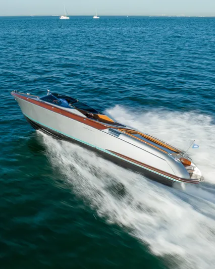 Mia Mia Yacht Photos Pics 2020 Riva Aquariva speedboat cruising on open water.