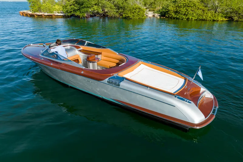 Mia Mia Yacht Photos Pics 2020 Riva Aquariva luxury speedboat on calm water.