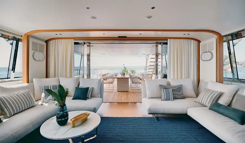  Yacht Photos Pics Luxurious interior of 2026 Benetti Motopanfilo 37 yacht with elegant seating and ocean view.