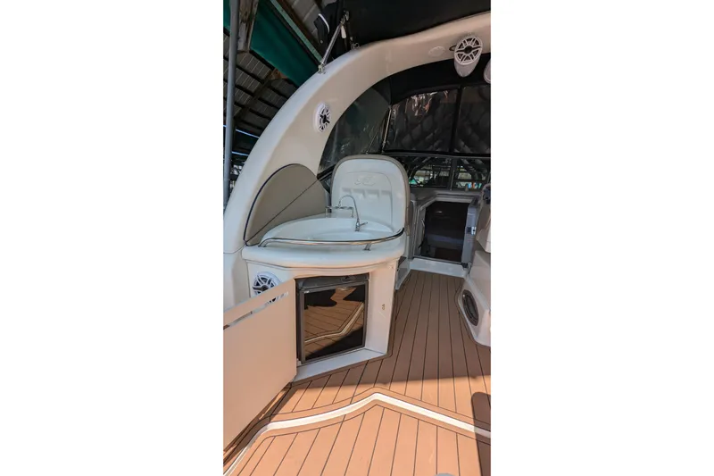  Yacht Photos Pics 2004 Sea Ray 340 Sundancer interior with seating and wooden flooring.