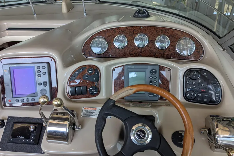  Yacht Photos Pics Dashboard of 2004 Sea Ray 340 Sundancer with navigation and control instruments.