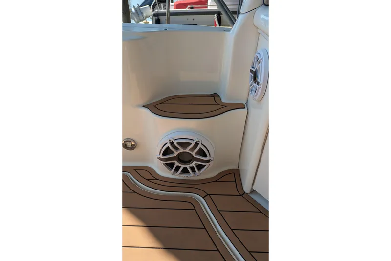  Yacht Photos Pics 2004 Sea Ray 340 Sundancer boat interior with speakers and teak flooring.