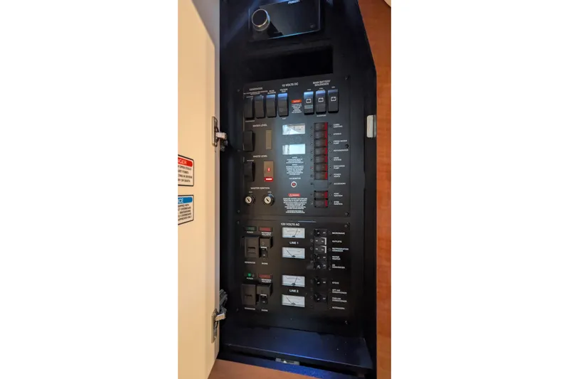  Yacht Photos Pics Electrical control panel inside 2004 Sea Ray 340 Sundancer boat.