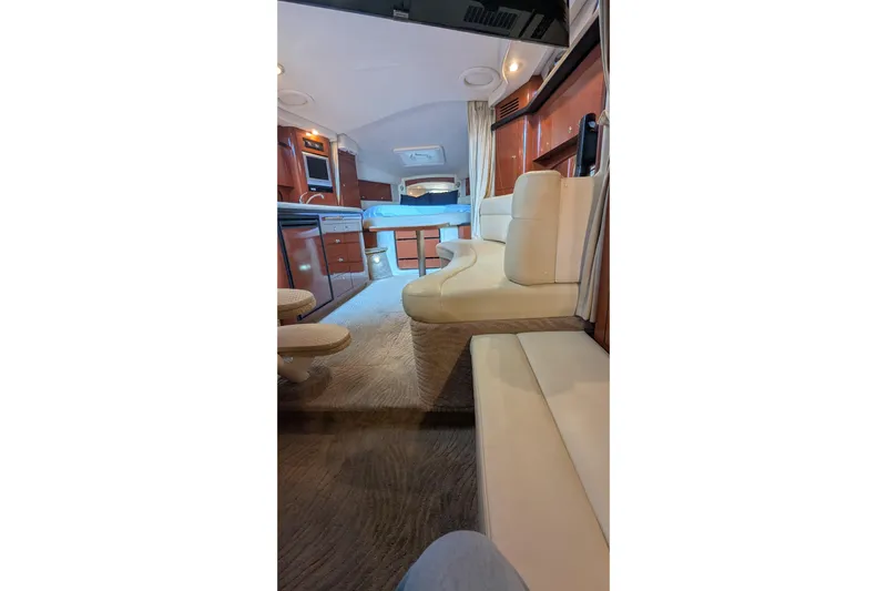  Yacht Photos Pics Interior of 2004 Sea Ray 340 Sundancer yacht with luxurious seating and modern amenities.