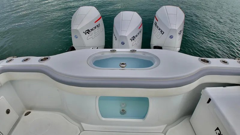  Yacht Photos Pics 2022 Yellowfin 42 Offshore boat with triple Racing engines.