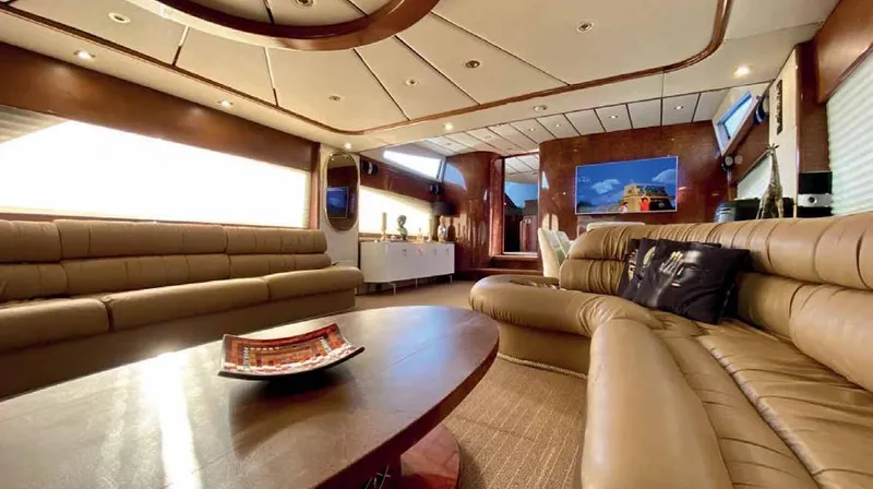 Vedo Yacht Photos Pics Luxurious interior of a 2004 Bilgin 30-meter yacht with elegant leather seating.