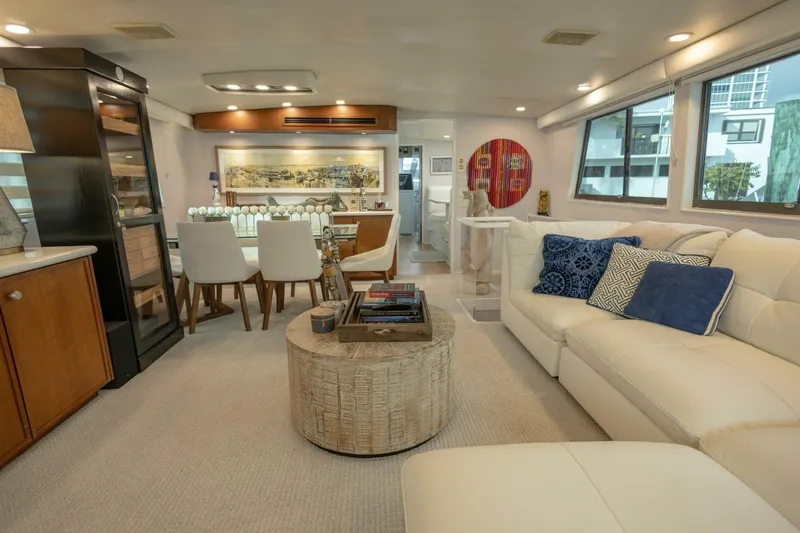  Yacht Photos Pics Luxurious interior of 1989 Hatteras Custom Cockpit yacht with elegant seating and decor.