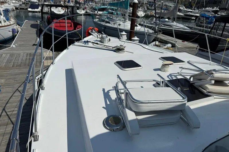  Yacht Photos Pics Deck view of 2000 LEBLANC Leo 38 yacht docked at marina.