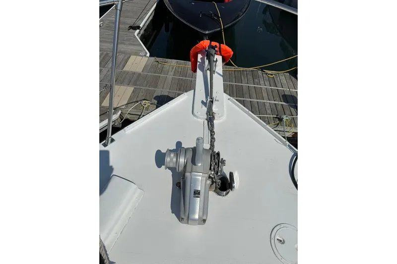  Yacht Photos Pics Bow of 2000 LEBLANC Leo 38 yacht with anchor chain and winch.