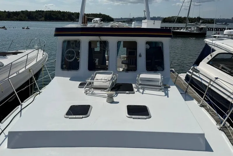  Yacht Photos Pics LEBLANC Leo 38 yacht, 2000 model, docked at marina with scenic water view.