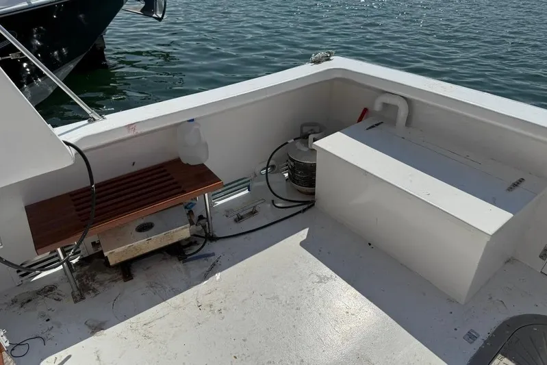  Yacht Photos Pics Deck of 2000 LEBLANC Leo 38 boat with equipment and water view.