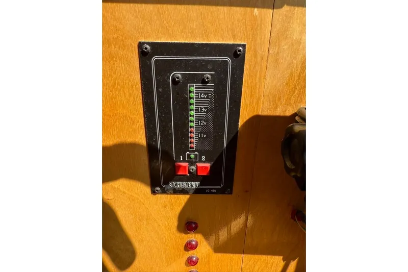  Yacht Photos Pics Control panel on a 2000 LEBLANC Leo 38 boat, featuring voltage indicators.