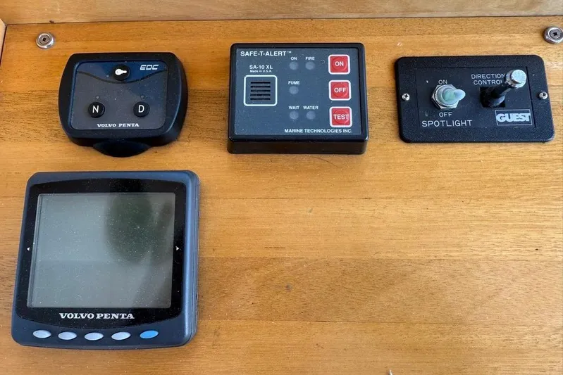  Yacht Photos Pics Control panel of a 2000 LEBLANC Leo 38 boat with various switches and displays.