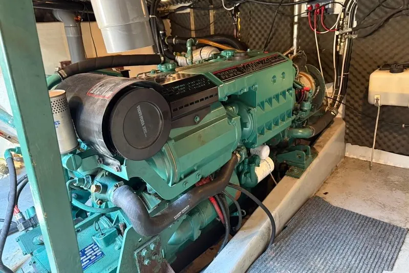  Yacht Photos Pics Engine room featuring a 2000 LEBLANC Leo 38 marine engine with visible components and wiring.