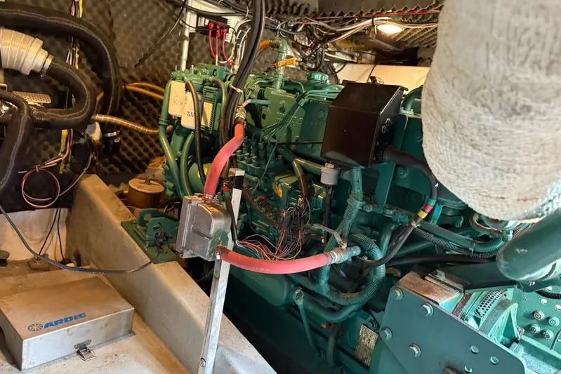  Yacht Photos Pics Engine room of a 2000 LEBLANC Leo 38 boat, showcasing complex machinery and wiring.