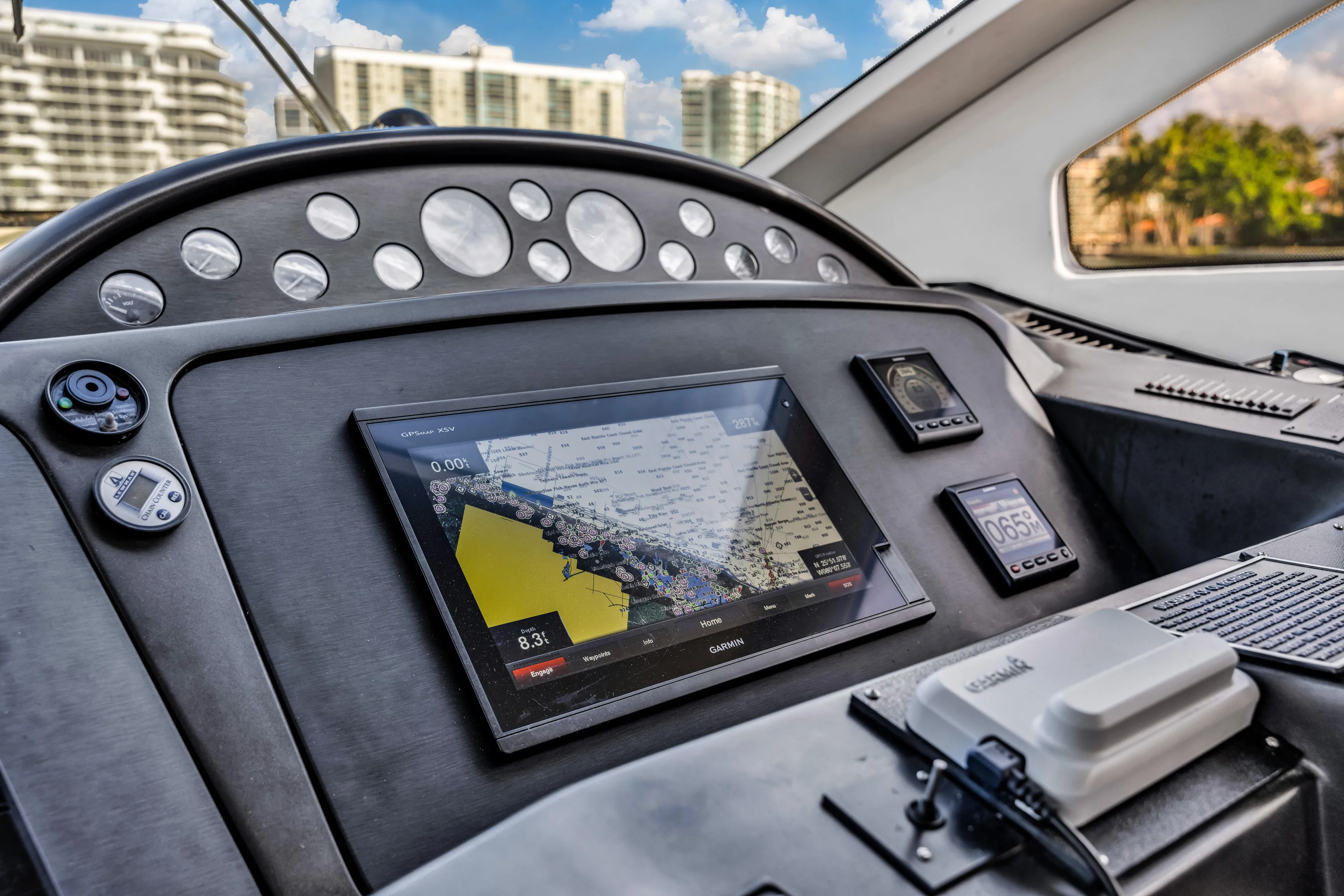 So What Who Cares Yacht Photos Pics Dashboard of 2003 Sunseeker 150 GT yacht with navigation display and controls.