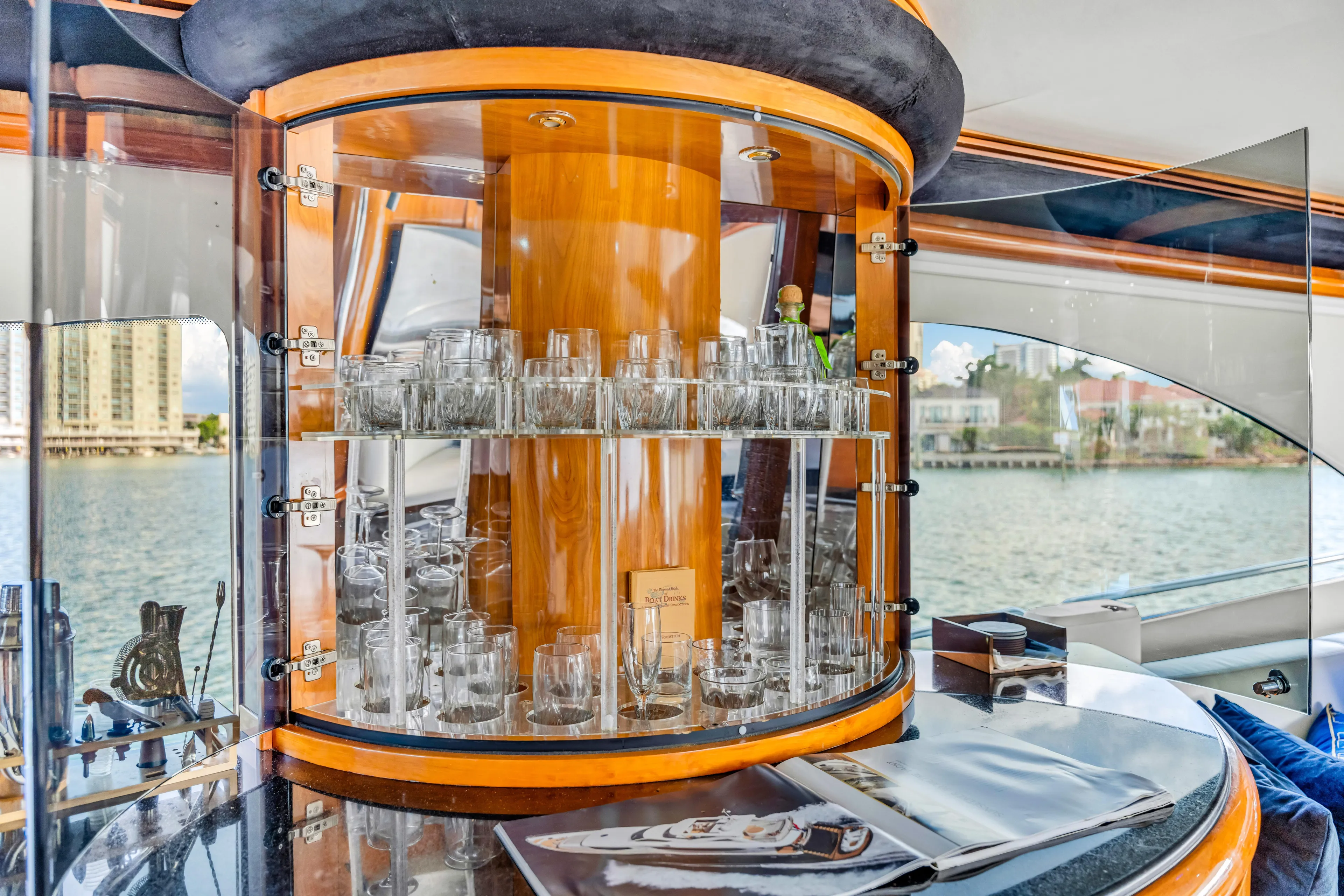 So What Who Cares Yacht Photos Pics Luxurious Sunseeker 150 GT yacht interior with elegant glassware display, 2003 model.