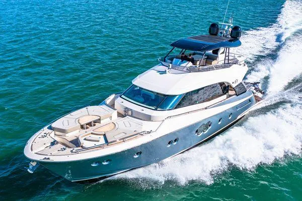  Yacht Photos Pics 2018 Monte Carlo Yachts MCY 70 cruising on open water.
