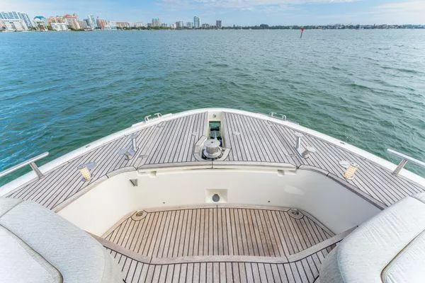  Yacht Photos Pics Bow view of 2018 Monte Carlo Yachts MCY 70 on calm water.