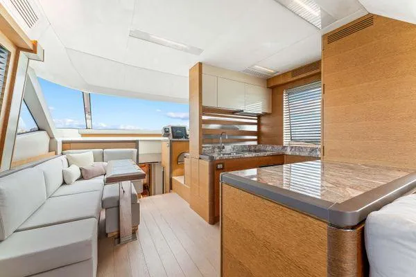  Yacht Photos Pics Luxurious interior of 2018 Monte Carlo Yachts MCY 70 with modern design and elegant furnishings.